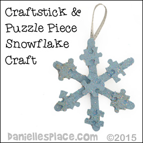 Craft Stick and Puzlle Piece snowflake craft from www.daniellesplace.com