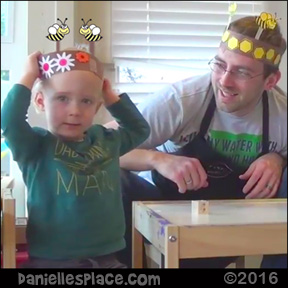 Logan Makes a Bee Hat Craft with his Dad - Toddler-tested Craft from www.daniellesplace.com