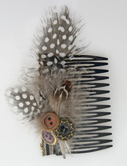 feather hair comb