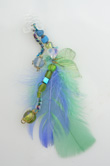 feather and bead hair extension