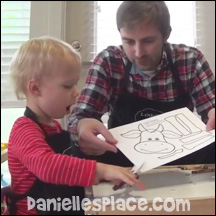 Logan Makes the Paper Plate Cow with his Dad