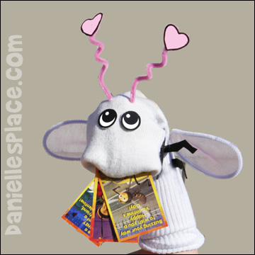 The teacher uses Love Bug Sock Puppet to present the Bible Lesson